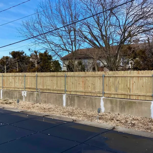Privacy Fence using Wood to Steel Adaptors