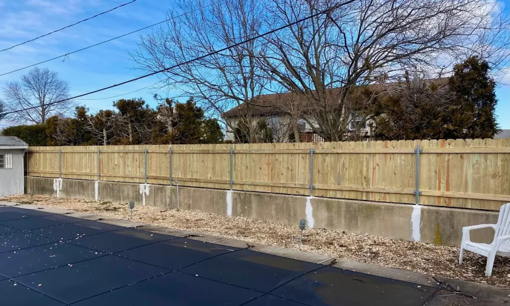 Privacy Fence using Wood to Steel Adaptors